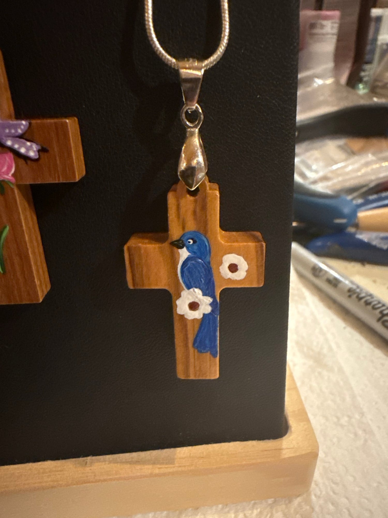 Bluebird cross pendant